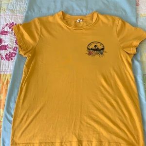 yellow-orange rip curl t-shirt
